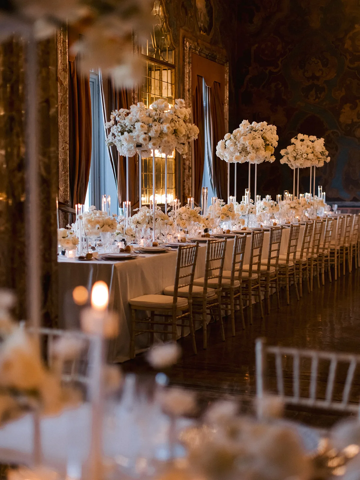 Atmospheric candlelit wedding dinner